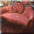 F08. Rococo Revival Victorian settee with grape carving. 